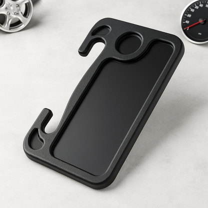 Black textured car steering wheel tray phone case with integrated tool slots and circular cutout for universal use