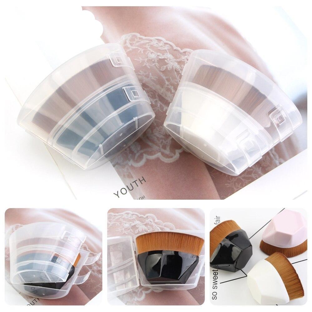 Clear plastic cases holding high density foundation brushes with geometric shapes black and white handles and brown bristles