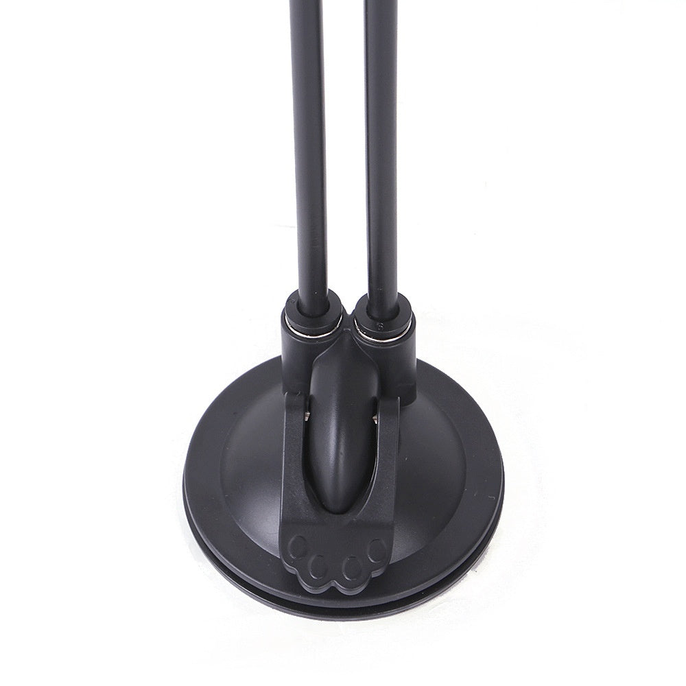 Black dual-armed desk lamp with circular suction base and adjustable metal arms for cat sucker teaser toy use
