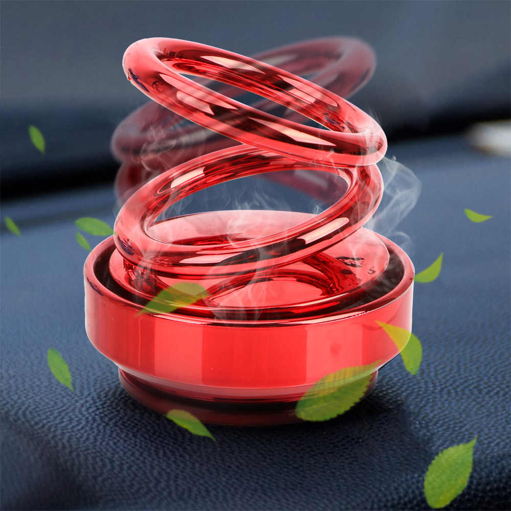 Vibrant red glossy spring-shaped auto rotation car air freshener with sleek metallic finish double ring design