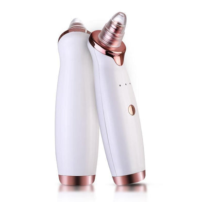 Two sleek white and rose gold electric blackhead remover vacuum devices with ergonomic handles and metallic accents