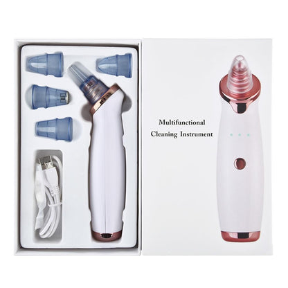 White and rose gold electric blackhead remover vacuum with interchangeable blue silicone tips for facial cleaning