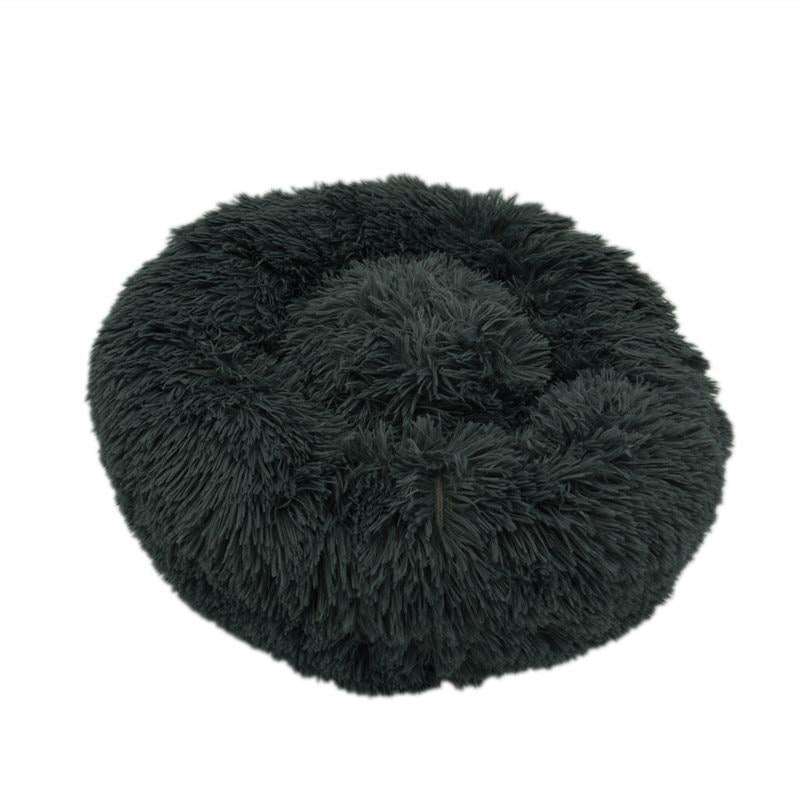Dark gray ultra-soft plush calming donut bed with a cozy circular design for dogs and cats