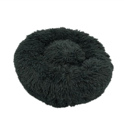 Dark gray ultra-soft plush calming donut bed with a cozy circular design for dogs and cats