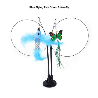 Cat sucker teaser toy with blue feathered flying fish and green butterfly cat toy featuring metallic scales and ribbons