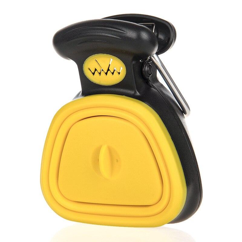 Black and yellow collapsible dog waste poop picker tool with clip-on handle for easy pet waste disposal